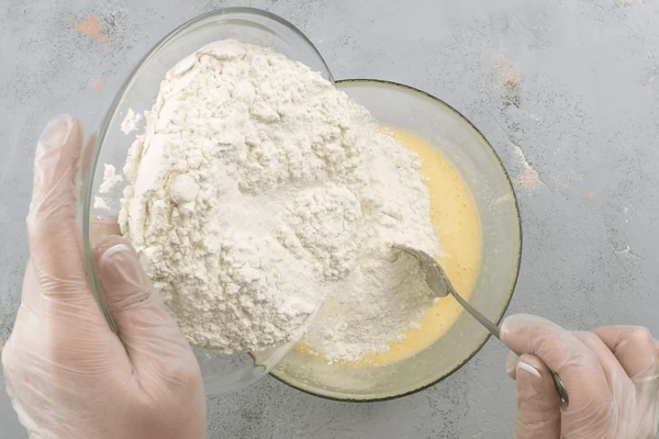  Затем добавить муку и замесить пластичное тесто. 