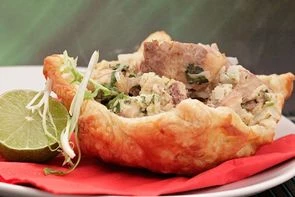 Сом тушеный в горшочках