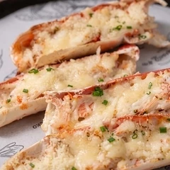 Камчатский краб запеченный с трюфельным соусом и пармезаном 1шт