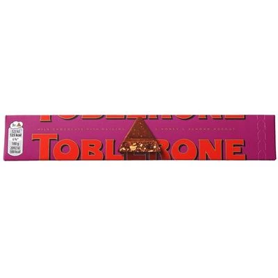 Шоколад Toblerone молочный с изюмом и медово-миндальной нугой 100г-0}