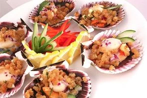 Гребешок запеченый на раковине 