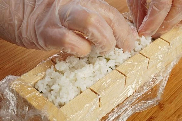 Еще слой риса.