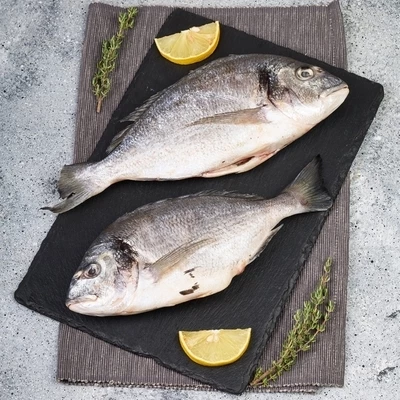 Дорадо средиземноморская потрошеная без чешуи ~600г-1}