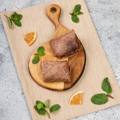 Блины шоколадные с апельсином Деликатеска 150г-1}