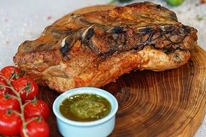 Свиные ребрышки в маринаде Конфи с соусом Чимичурри