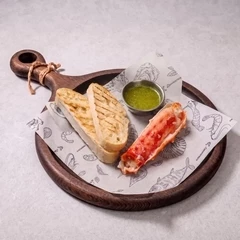 Краб камчатский с чесночным маслом и зеленью 1шт