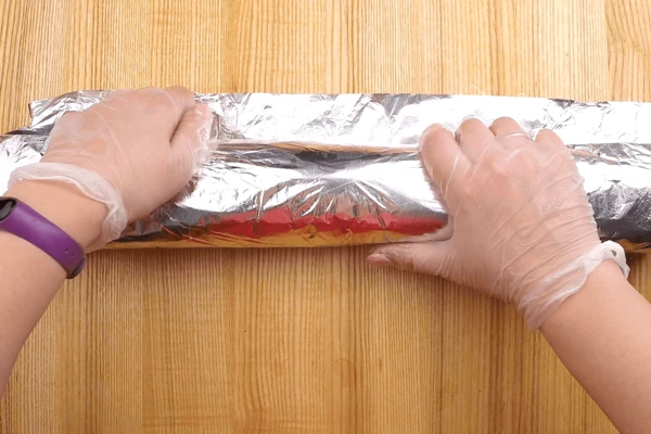 Завернуть рулет в фольгу и поставить в разогретую до 180С духовку на 2-3 часа, до готовности мяса.